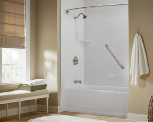 Bathroom with a white bathtub and shower combination solution.
