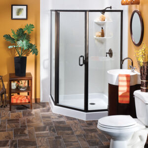 Modern bathroom that has a corner shower with half-hexagonal shape and glass walls