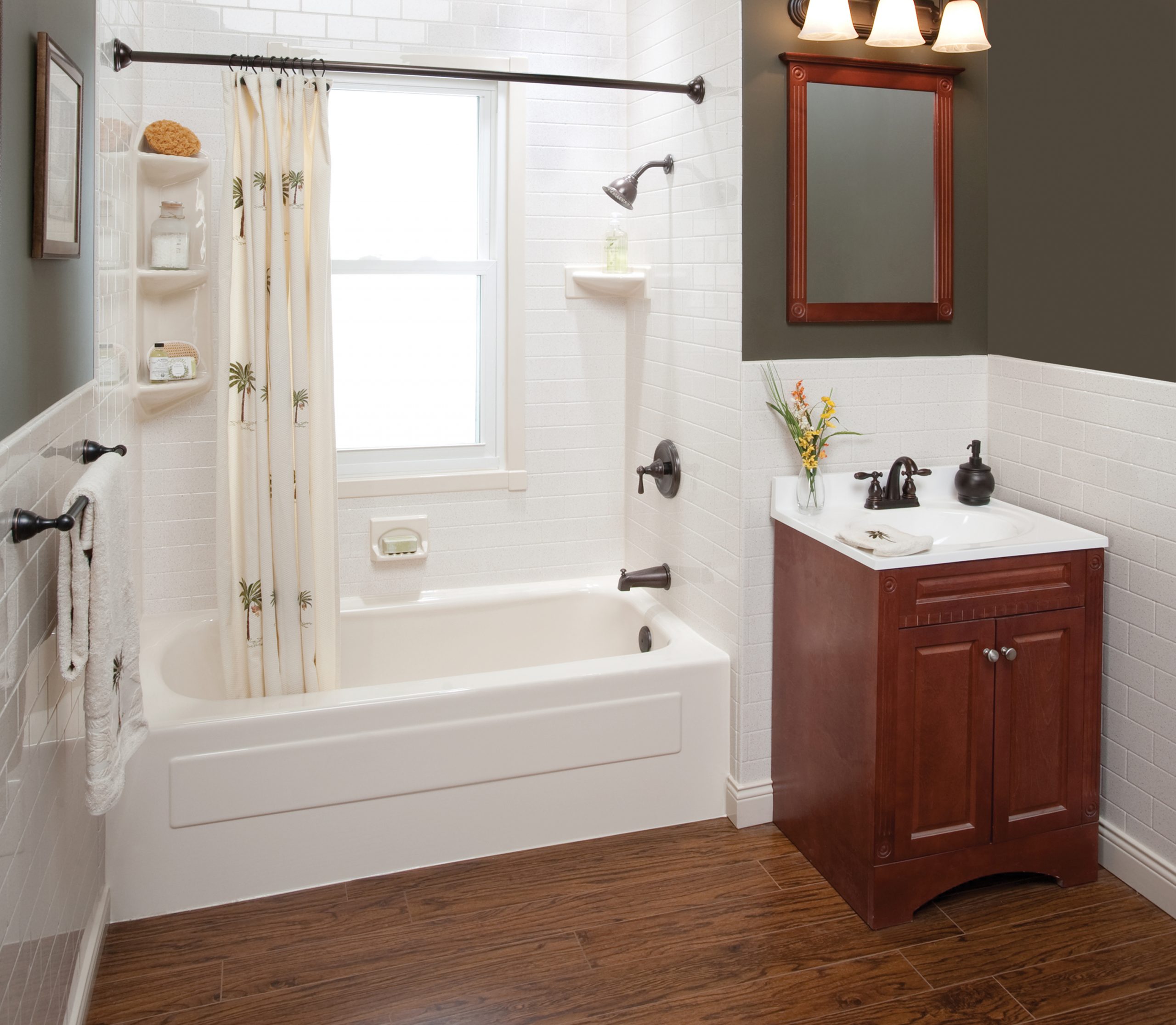Luxury bathroom with vanity, washbasin, cabinet, and white bathtub.